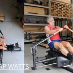 Rower showing early arm bend on indoor rowing machine